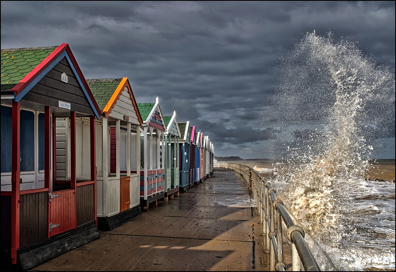 "Beach Huts and Spray, Southwold, Suffolk" by Steve M. Walker is licensed under CC BY-ND 2.0. To view a copy of this license, visit https://creativecommons.org/licenses/by-nd/2.0/?ref=openverse.